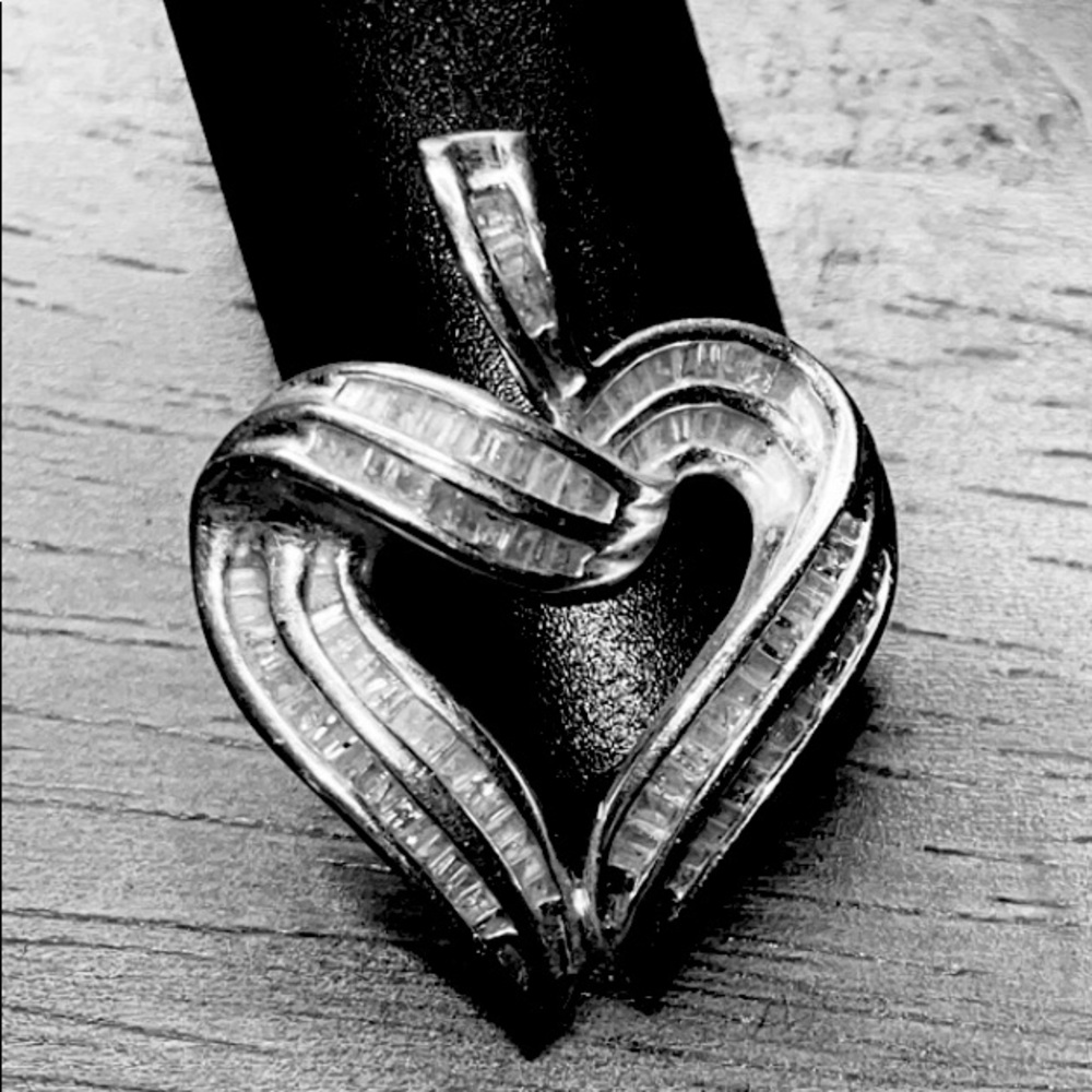 White gold diamond heart pendant.